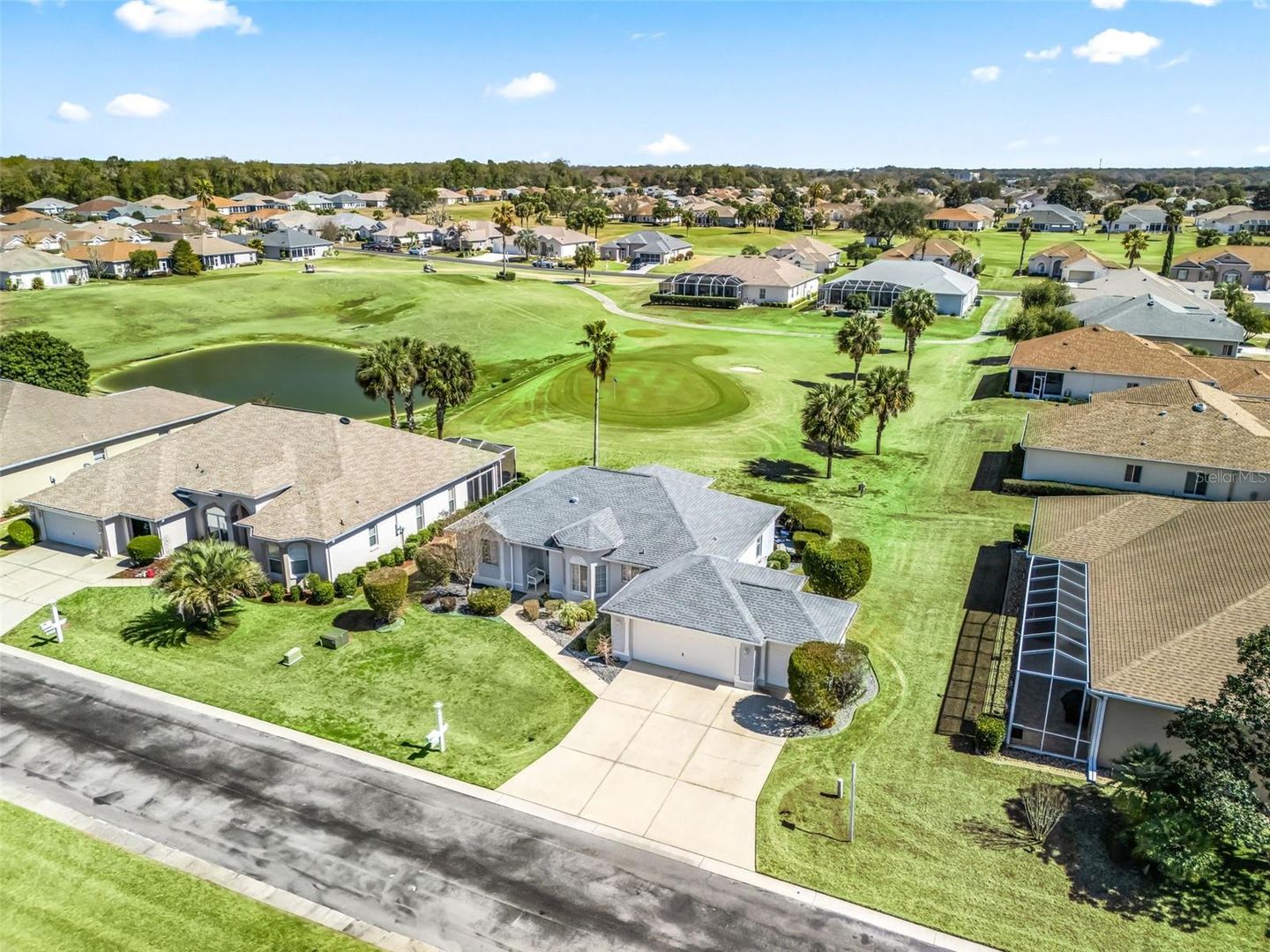 Fabulous Golf Course home with a GOLF CART GARAGE! Welcome to your new – image 2